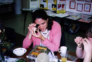 Teacher using a loupe at a Private Eye Workshop