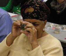 NSTA participant using a Private Eye jeweler's loupe.